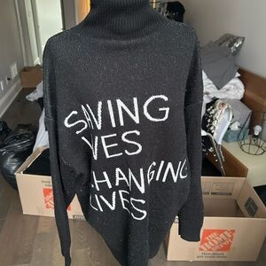 balenciaga “saving lives changing lives” sweater
